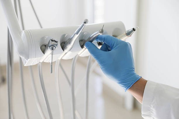 Professional Tooth Extraction technician working in Girard, IL